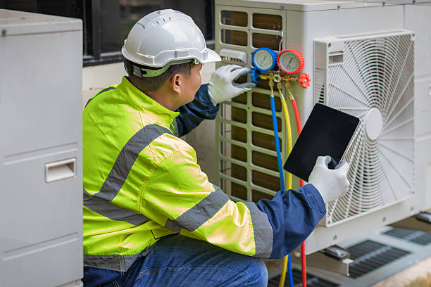 Professional Air Conditioning Repair technician working in Mansfield Center, CT